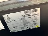 a label on the back of a car with a barcode on it