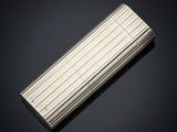 a close up of a lighter on a black surface