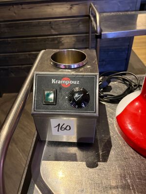 a machine that is sitting on a counter in a kitchen