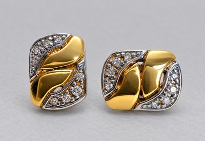 two tone gold and silver earrings with diamonds