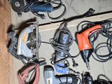many different types of power tools on the floor