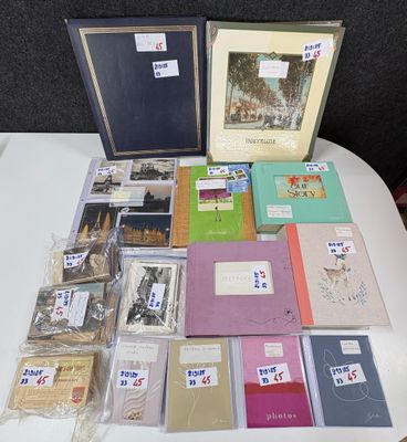 a lot of books on a table with pictures on them