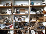 many boxes and boxes on the shelves in the room