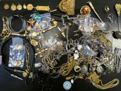 a table with a lot of jewelry on it