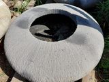 a pile of tires that are sitting on the ground