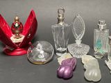a lot of glass items that are sitting on a table