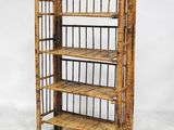 an image of a bamboo shelf with four shelves on top of it