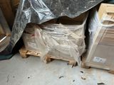 a pile of boxes that are sitting on a pallet