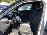 the interior of a car with the driver ' s seat folded down