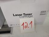 a close up of a box of laser toner cartridges with a price tag