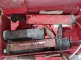 a red tool box with tools inside of it