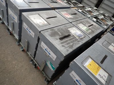 a lot of metal boxes stacked on top of each other