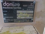 a sign on the wall that says donutre machines textiles