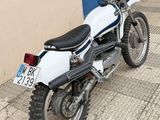 a motorcycle that is parked on the side of the street