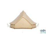 a large beige tent sitting on top of a white floor
