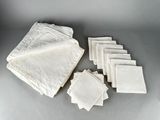 several pieces of white paper sitting on top of a table