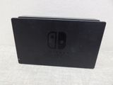the nintendo switch is sitting on a white surface