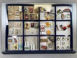 a display case with a lot of magnets in it