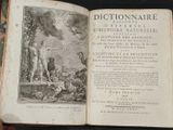 an open book with a picture of a man and a woman on it