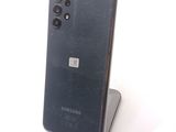 a close up of a cell phone on a stand