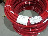 a red hose that has a price tag on it
