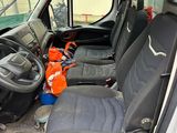 an image of a van with the front seats down