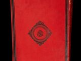 a red book with a black border and a black and red cover