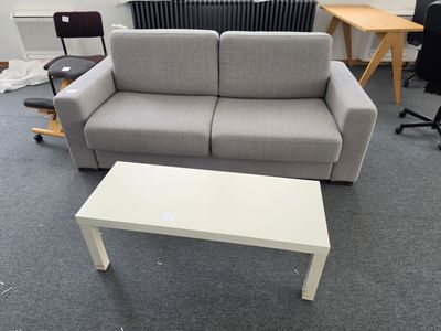 a couch and a coffee table in a room