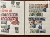 a book with stamps on the pages and a book with stamps on the pages