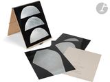 three cards with a picture of a half moon in the middle of them