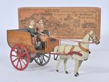 a toy horse pulling a carriage with two people in it
