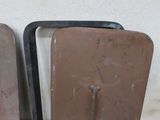 two pieces of luggage sitting on the floor next to each other