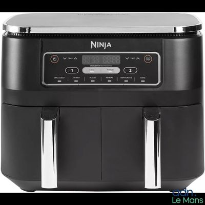 an air fryer with a digital display on top of it