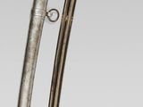 two swords with a bird on one of them and a sword with a bird on the other