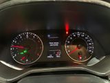 a close up of a car dashboard with a speedometer and gauges