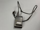 a small charger with a cord attached to it