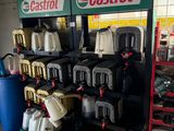 many different types of gas cans on display in a store