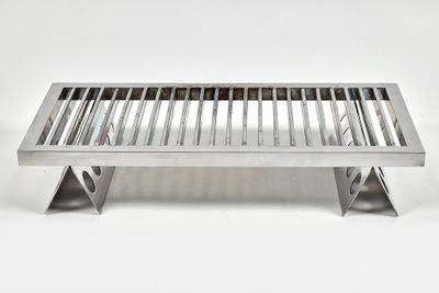 stainless steel grill grate on a white background