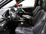 a picture of the inside of a car with a steering wheel