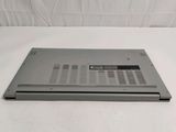 an open laptop computer sitting on top of a white surface