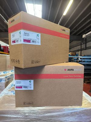 two boxes are stacked on top of each other in a warehouse