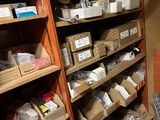 many boxes and boxes on the shelves in the room
