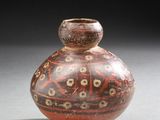 a small vase that is sitting on a table