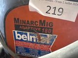 a close up of a metal tank with a label on it