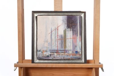 a picture of a painting on a easel with a picture on it