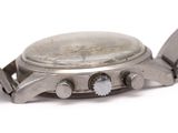 an image of a close up of a watch on a white surface