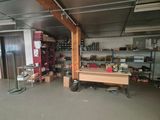 an image of a room with a lot of clutter on the floor