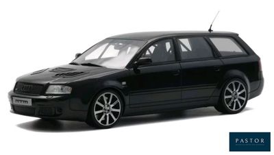 the black car is parked in front of a white background