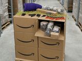 an image of a cardboard box with a bunch of items on top of it