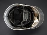 a close up of a helmet on a black background